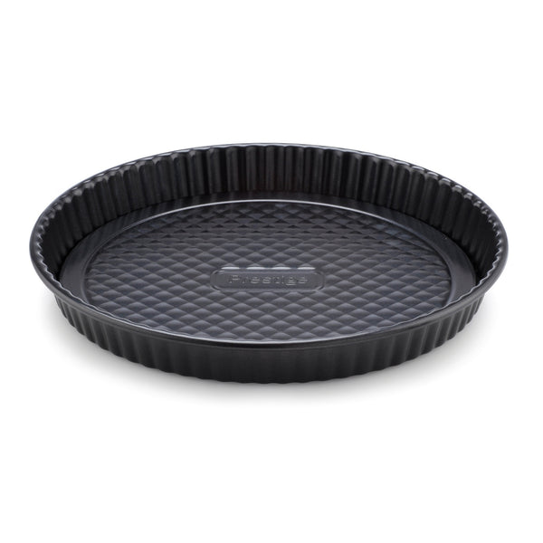 Prestige Inspire non stick quiche tin. Heavy carbon steel for extra durability. Cook delicious quiches and pies easily, without them getting stuck to the sides of the tin